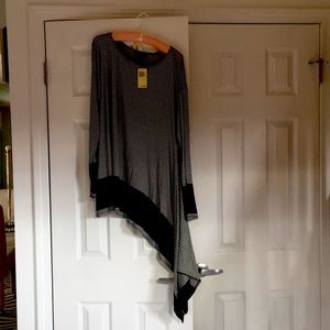 Black /white top  longer on one side then other. Could tie